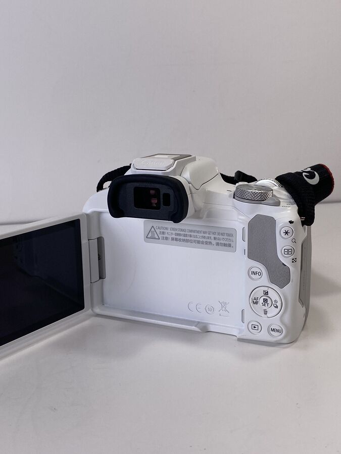 White Canon EOS R50 4K Video Mirrorless Camera with RF-S 18-45mm f/4.5-6.3